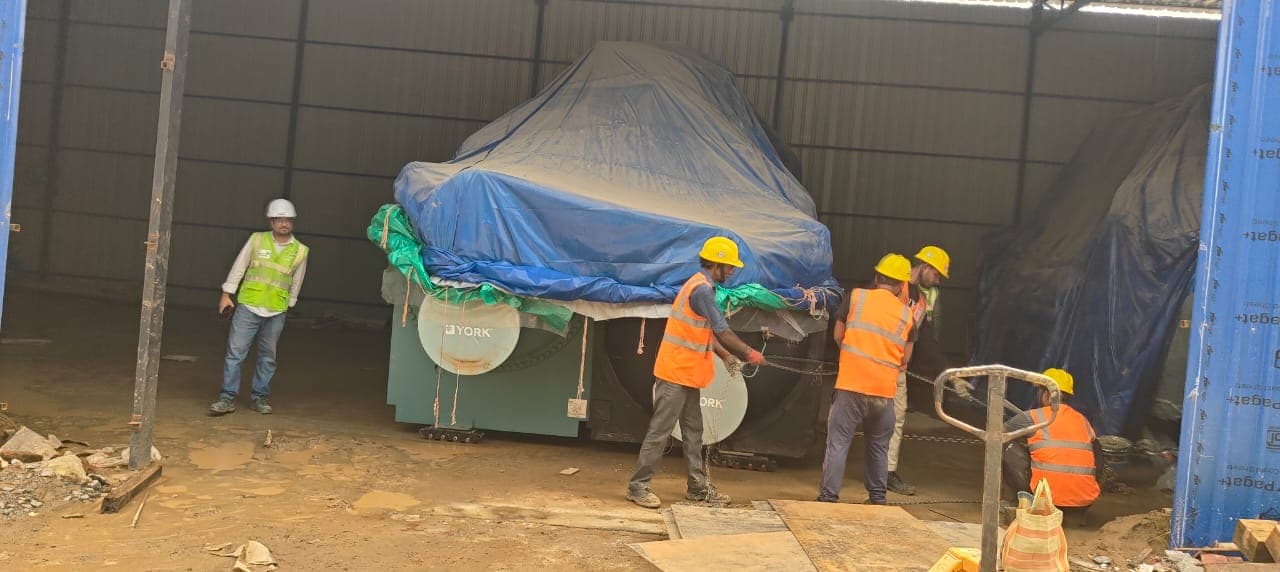 Wrapped Johnson Controls YORK chillers with the IPN LIFTERS crew inside the OSAT semiconductor facility, Assam